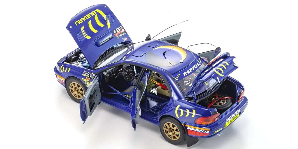 Subaru Impreza 555 #4 RAC Rally 1994 Blue 1:18 Diecast Model Car — Kyosho - Garage 73